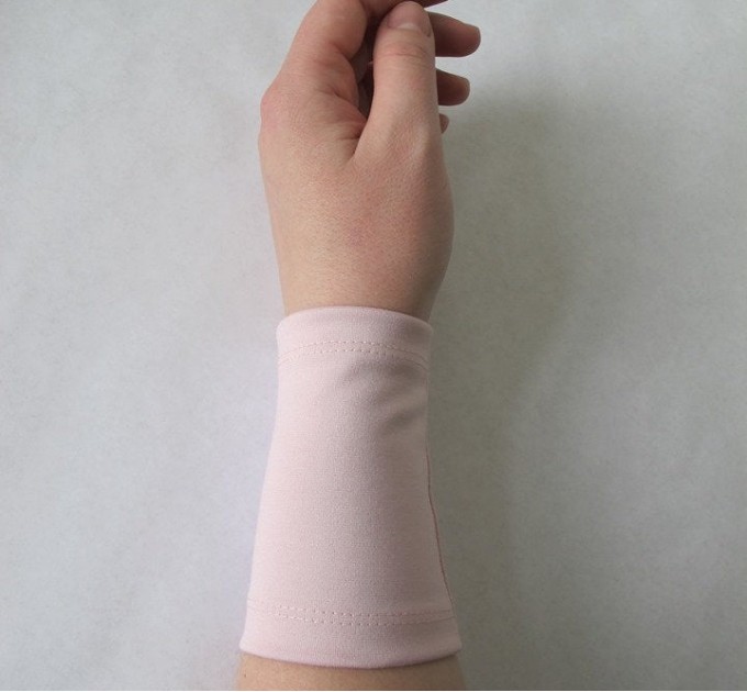 Pink wrist tattoo cover up