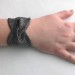 Set of 9 twist wrist cuffs