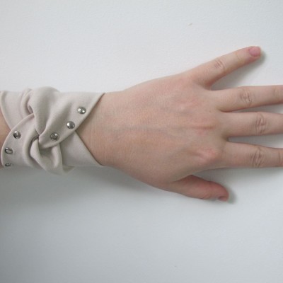 Nude wrist cuff bracelet with metal drops