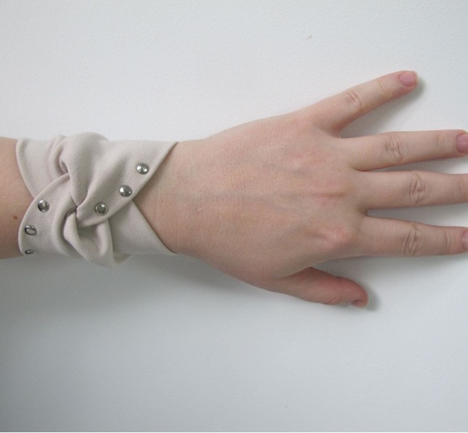 Nude wrist cuff bracelet with metal drops
